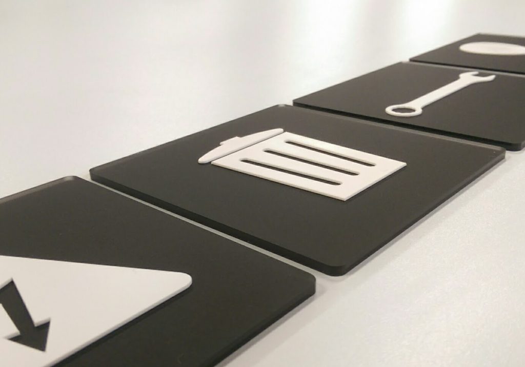 Tactile AODA icon signs